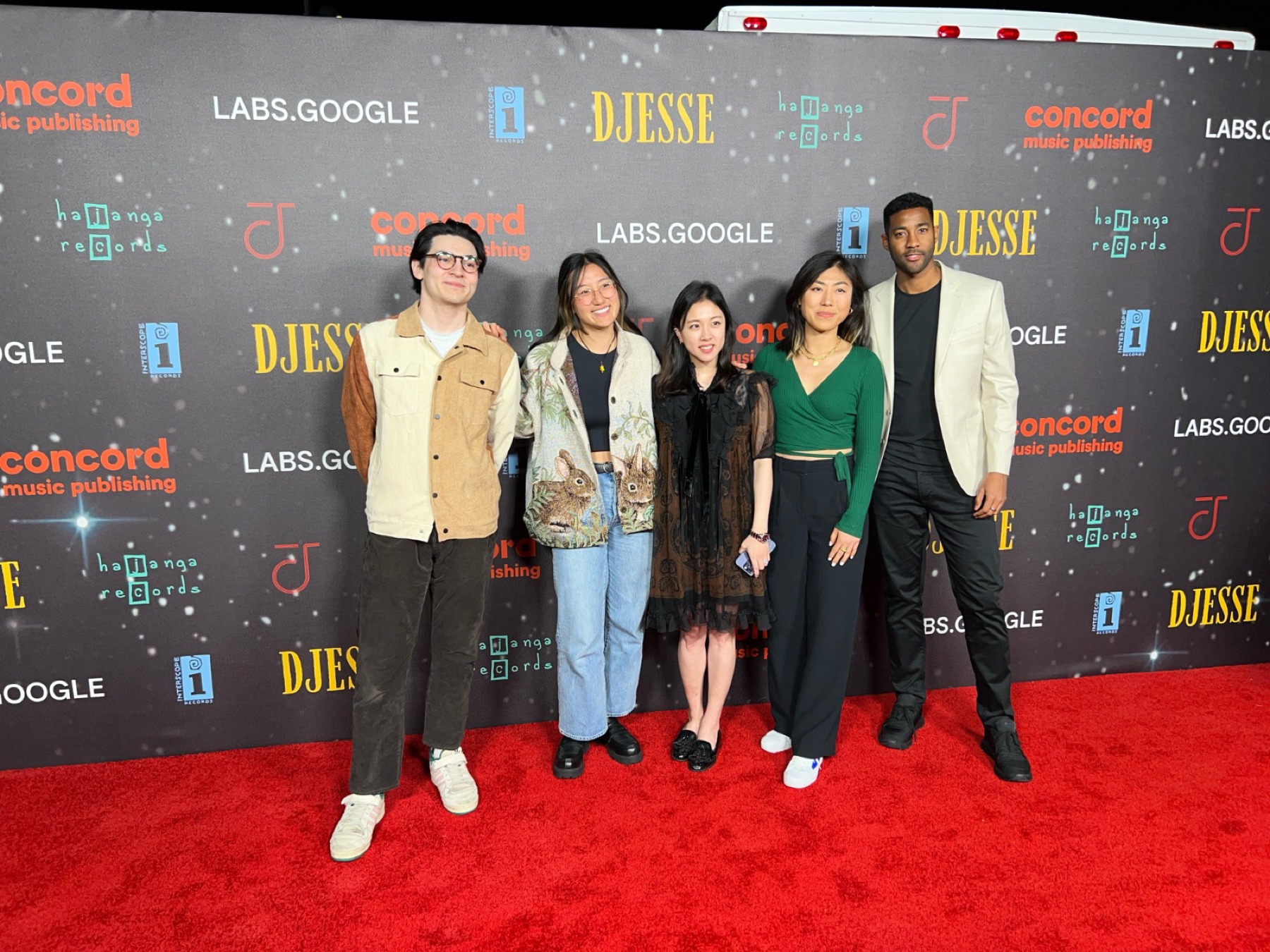 Tahj and four guests on the red carpet